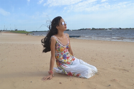 Woman beach body of water sea Photo