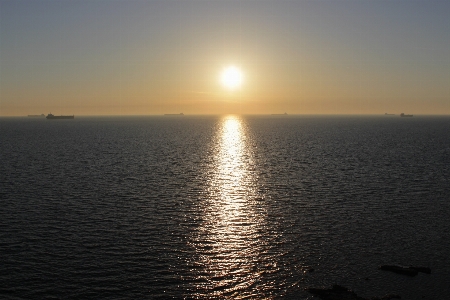 Sunset sun over the sea Photo