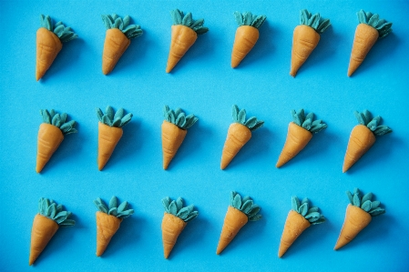 Artificial background blue carrot Photo