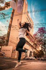 Girl balloons summer city Photo