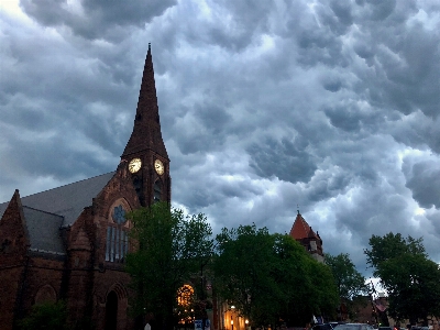 Storm clouds church steeple clock northampton Photo