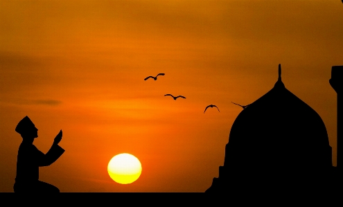 Islamic prayer dusk sun Photo