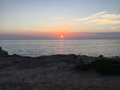 Italy sea sunset horizon Photo