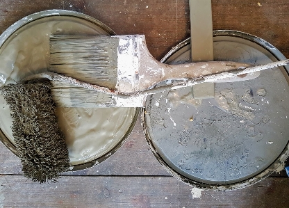 Paint brushes roller wood floor Photo