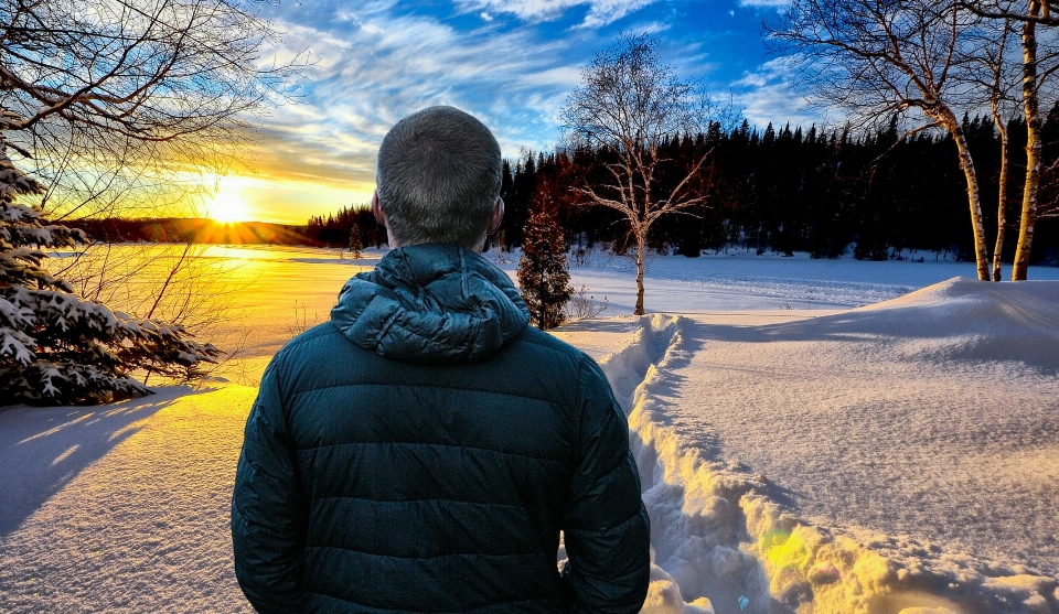 Winter man landscape sunset