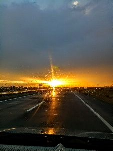 Sunset rain road sky Photo