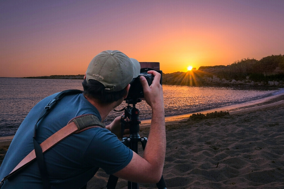 Photographer capture sunset camera