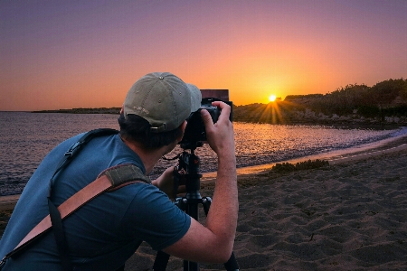 Photographer capture sunset camera Photo