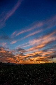 Sunset sky clouds horizon Photo