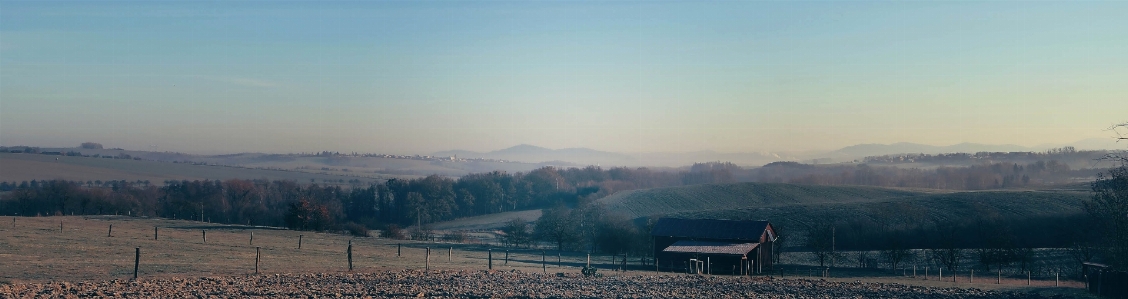 Countryside panorama autumn foggy Photo