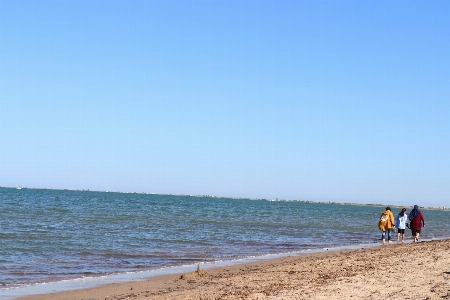 Beach woman water sand Photo