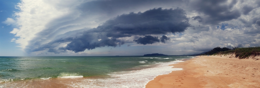 Ocean beach clouds storm Photo