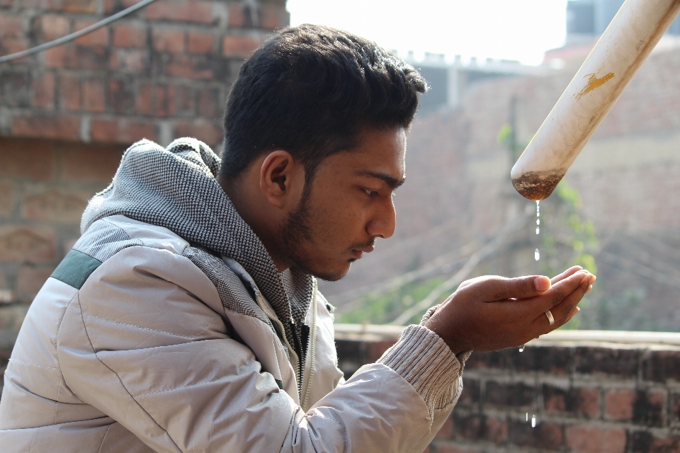 Boy water drops drinking