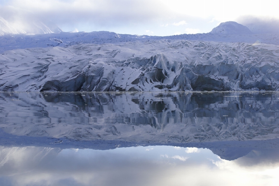 Reflection mountain range mountainous landforms ice