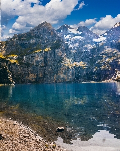 Mountain body of water mountainous landforms natural landscape Photo