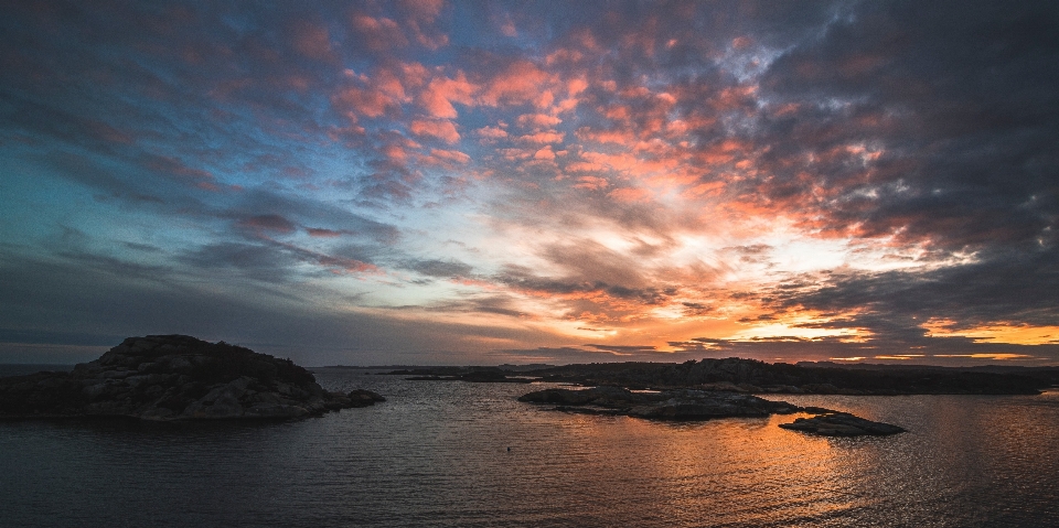 Sky body of water horizon afterglow