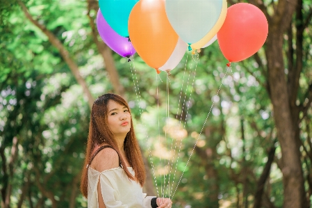 People in nature balloon green red Photo