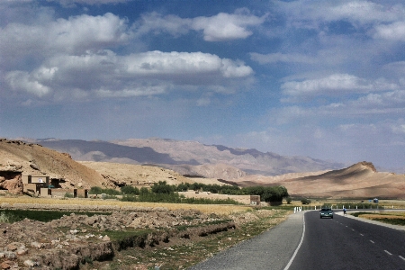 Mountainous landforms sky road highland Photo