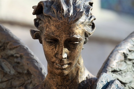 Close up face statue sculpture Photo