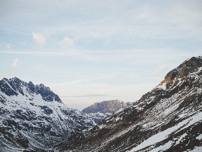 Mountainous landforms mountain range sky Photo