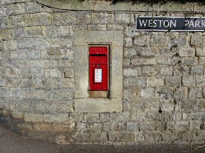 Wall post box red brickwork Photo