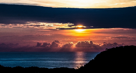 空 地平線 残光
 日没 写真