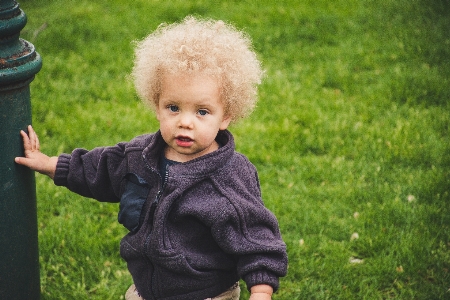 Child face photograph grass Photo