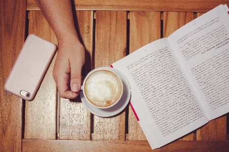 Wood book cup hand Photo