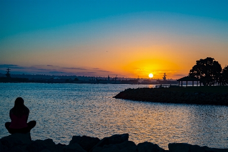 Sky afterglow horizon water Photo