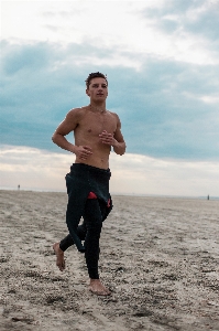 Foto Corsa jogging ricreazione spiaggia