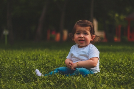 Child people in nature grass green Photo