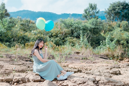 People in nature photograph turquoise blue Photo