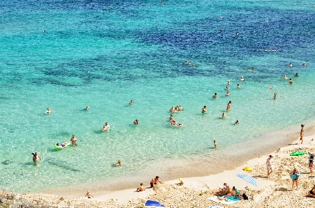 Foto Gente en la playa
 cuerpo de agua
 playa mar