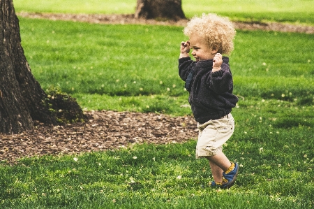 People in nature child grass Photo