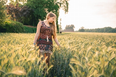 People in nature field grass sunlight Photo