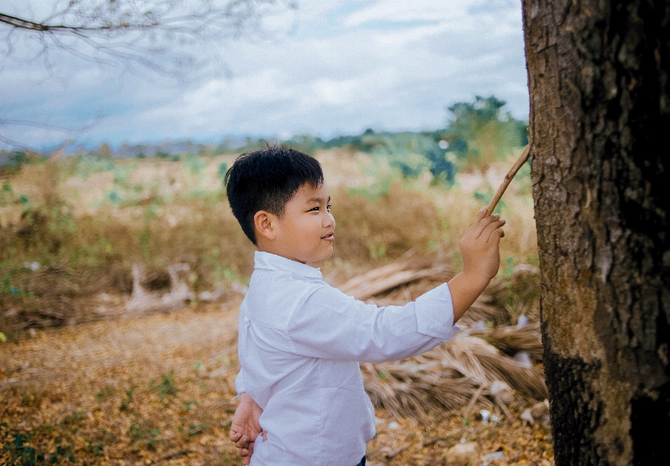 People in nature photograph tree child