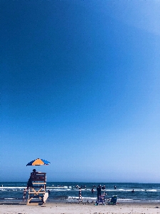 Sky beach blue sea Photo