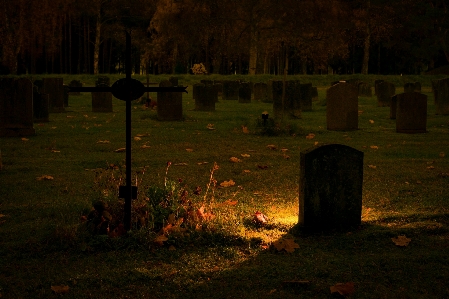 Cemetery grave headstone night Photo