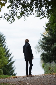 People in nature photograph standing tree Photo