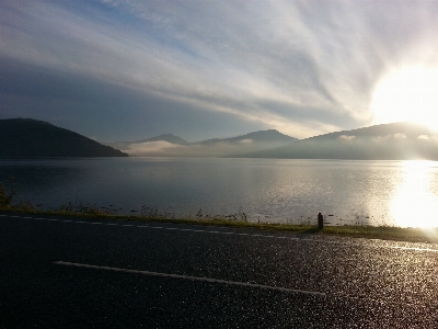 Morning water clouds loch Photo