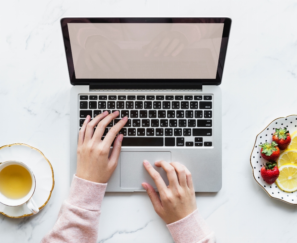 Computer keyboard laptop coffee cup technology