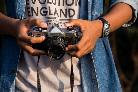 Foto Jeans tangan optik kamera
 denim