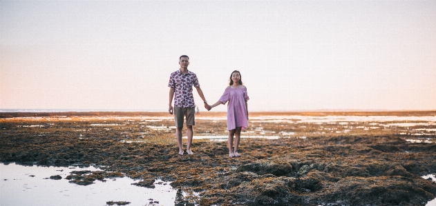 People on beach in nature photograph Photo