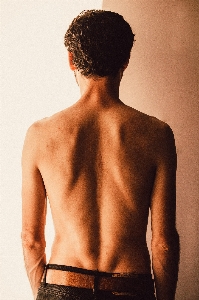 Barechested back shoulder skin Photo