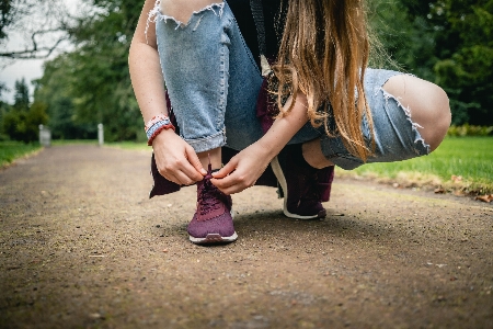 People in nature photograph pink footwear Photo