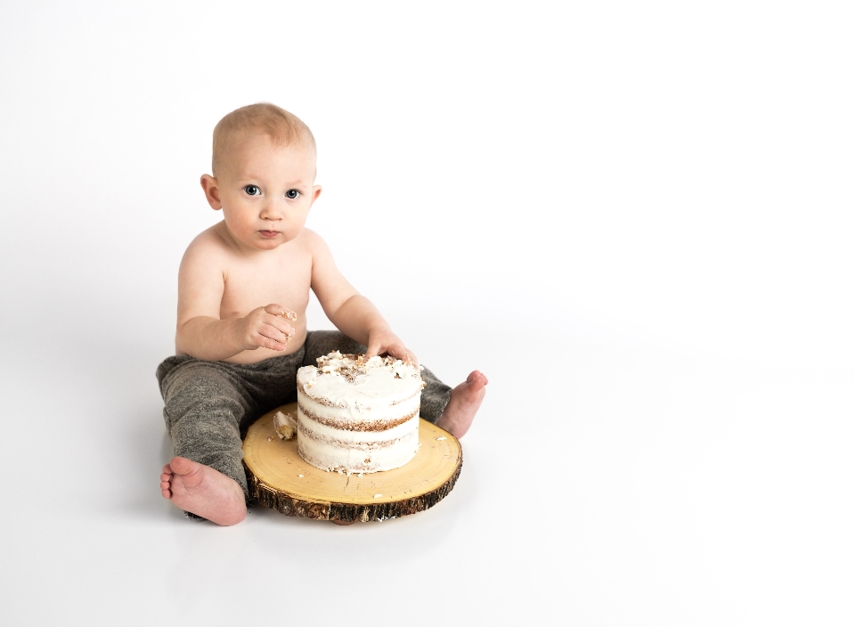 Child figurine sitting toddler