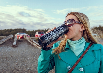 Eyewear glasses sunglasses drinking Photo