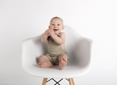 White child sitting product Photo