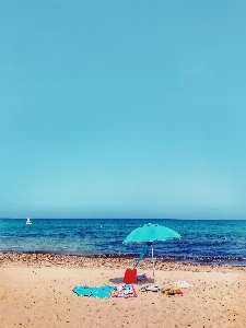 Beach people on body of water sea Photo