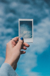 Blue sky cloud hand Photo